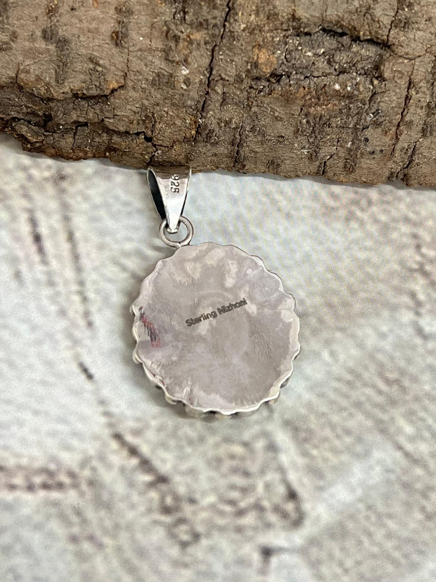 Handmade Sterling Silver White Buffalo Turquoise Pendant with Signed Nizhoni