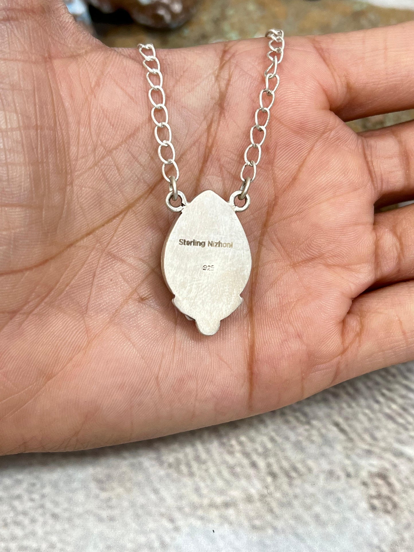 Handmade Sterling Silver White Buffalo Turquoise Necklace with Signed Nizhoni