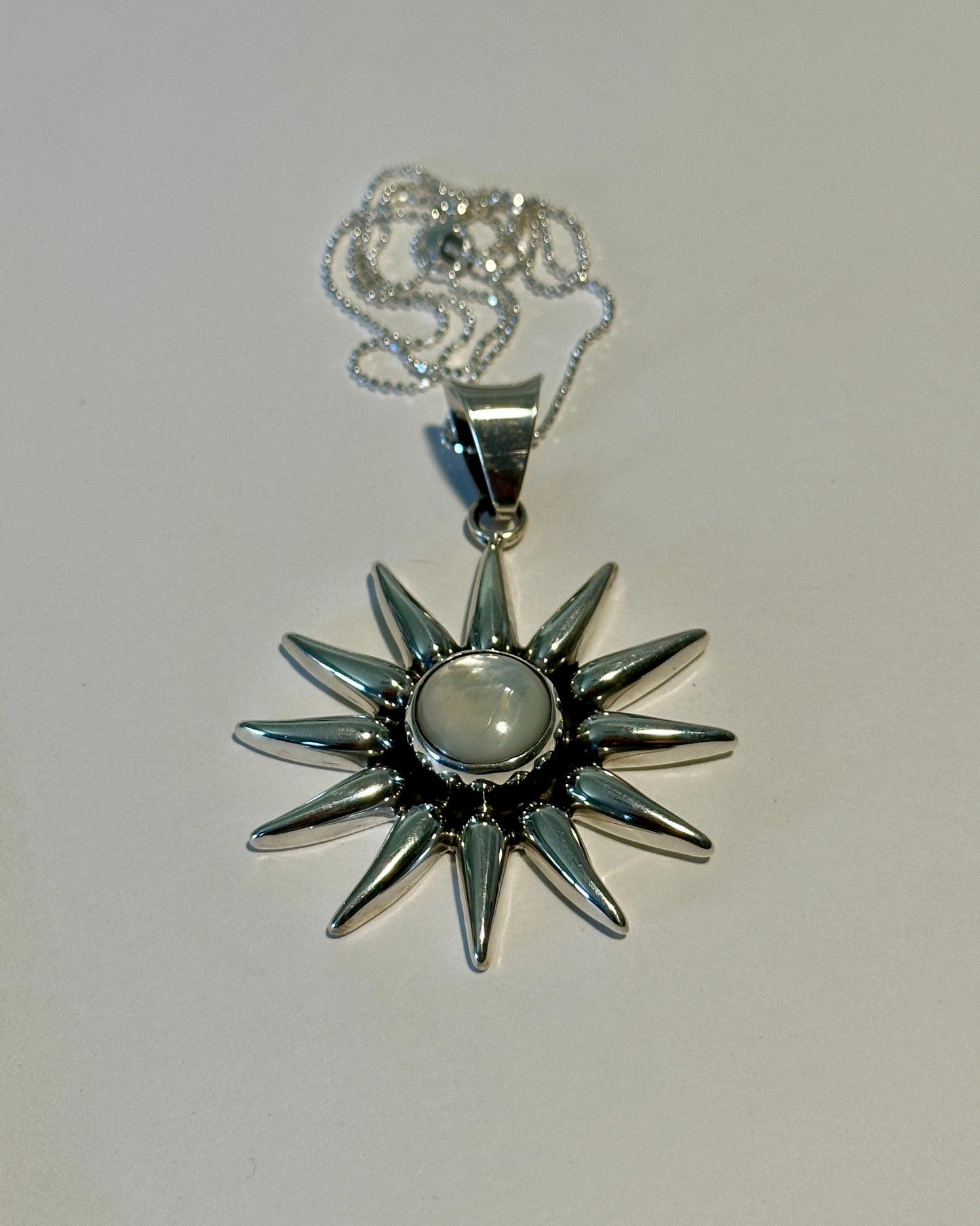 Mother Of Pearl Sunburst Pendant Necklace