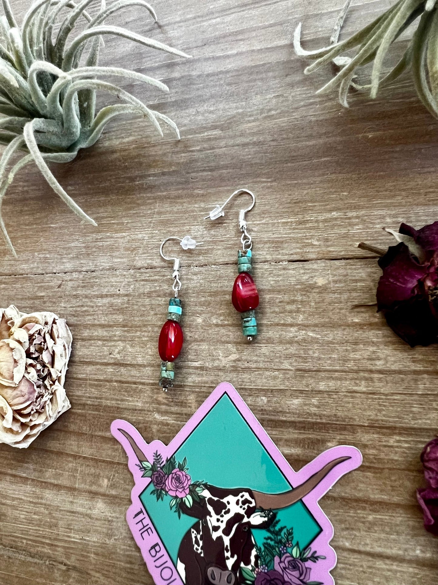 Green turquoise dangle earrings with red corral