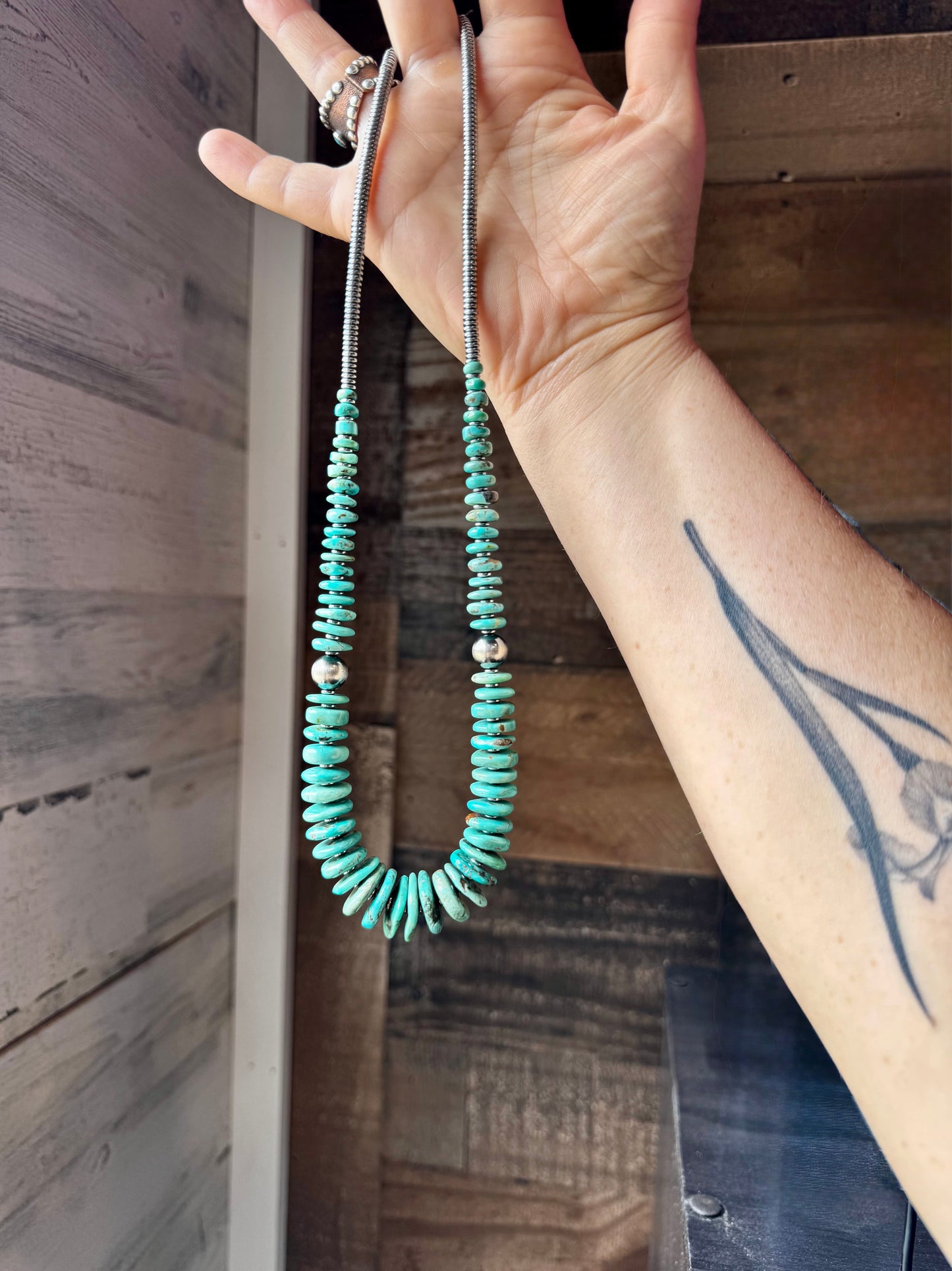 22 inch Graduated Green/Blue necklace with Sterling silver pearls