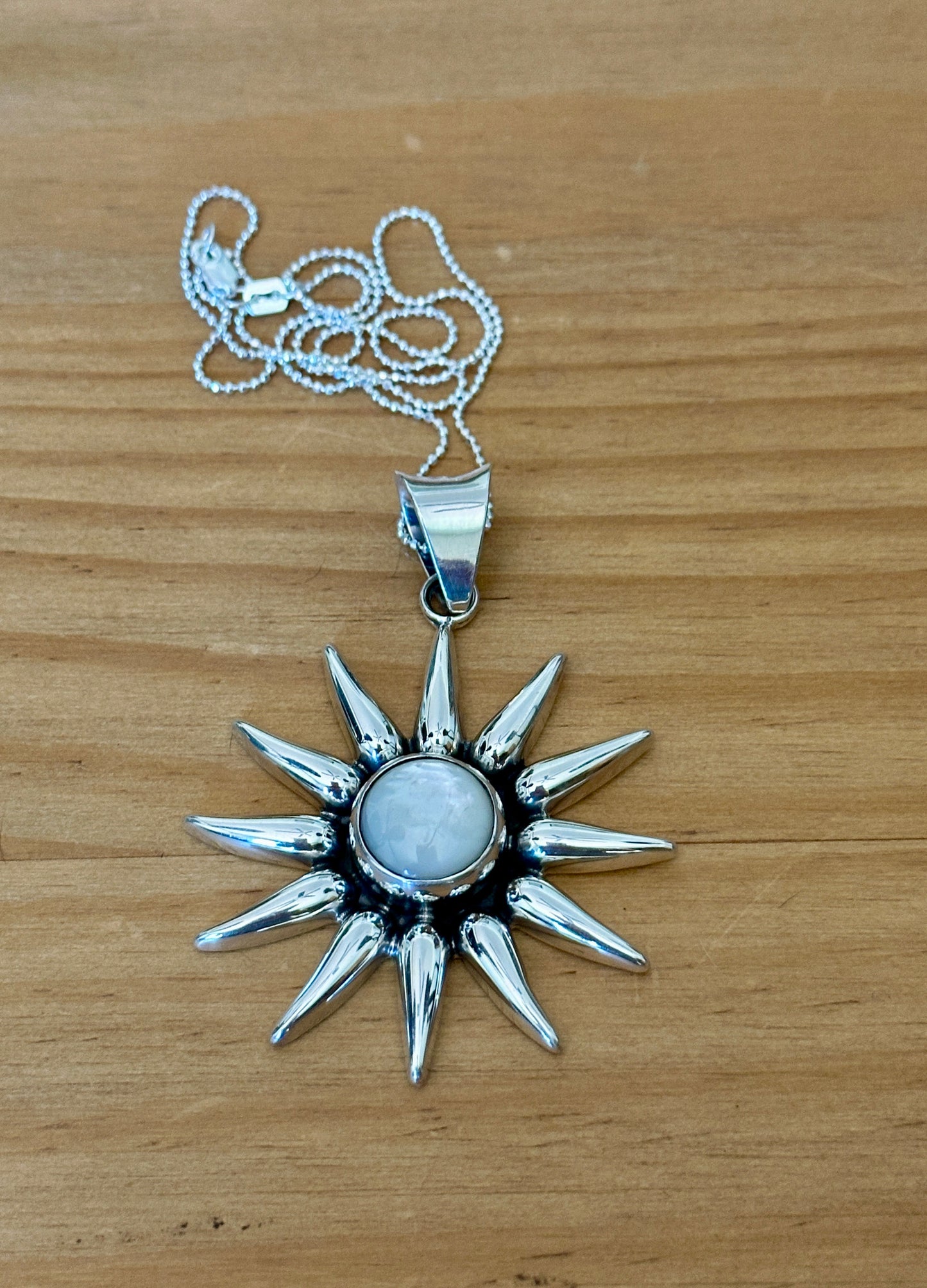 Mother Of Pearl Sunburst Pendant Necklace