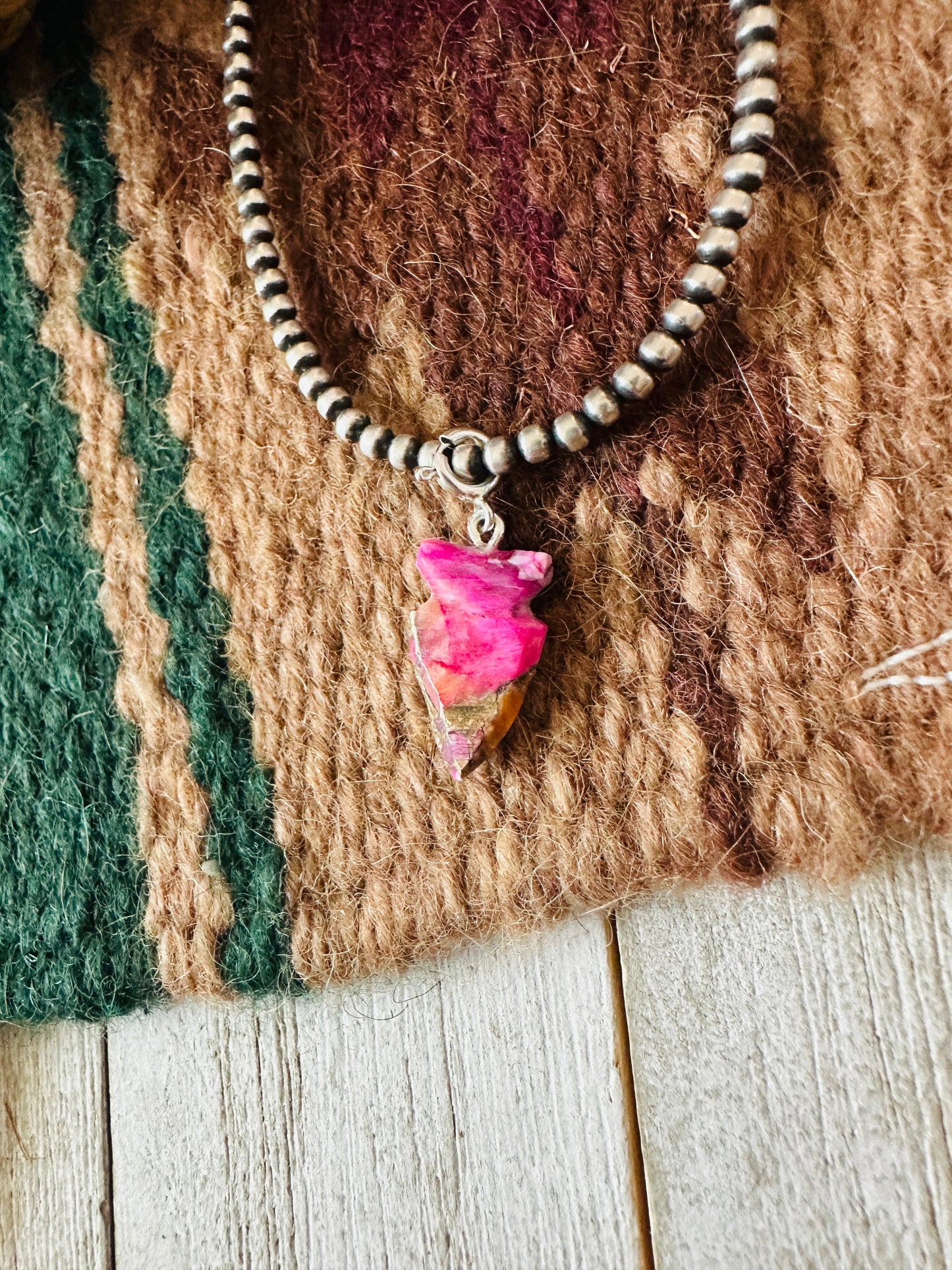 Navajo Hand Carved Pink Mojave Arrowhead Charm